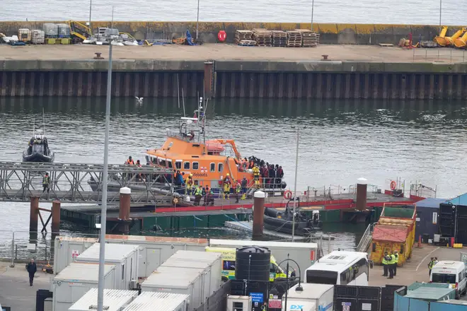 A group of people thought to be migrants are brought in to Dover, Kent, by the Border Force