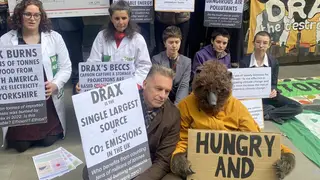 Broadcaster Chris Packham and members of the Axe Drax campaign group protesting outside the Drax AGM
