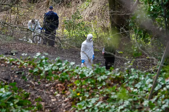 Police and forensic officers at Kersal Dale, near Salford, Greater Manchester, human remains were found