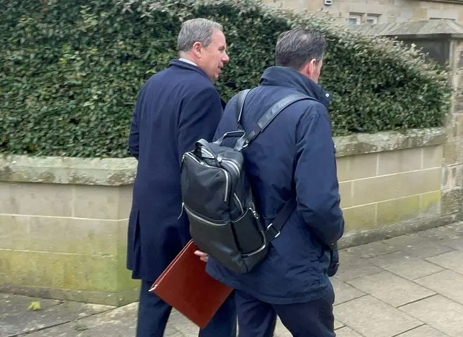 Defendant Chris Makin (left) leaves Harrogate Magistrates Court in North Yorkshire after he was fined £4,800