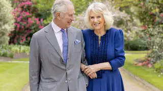 King Charles III and Queen Camilla pictured together in the gardens of Buckingham Palace