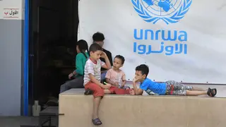 Palestinian children who fled with their parents from their houses in the Palestinian refugee camp of Ein el-Hilweh, gather in the backyard of an UNRWA school in Sidon, Lebanon in September 2023