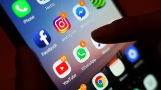 Social media apps displayed on a mobile phone screen