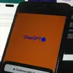 OpenAI’s ChatGPT app is displayed on an iPhone
