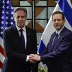 US Secretary of State Antony Blinken shakes hands with Israeli President Isaac Herzog