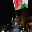 Demonstrators with Palestinian flag