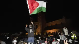 Demonstrators with Palestinian flag