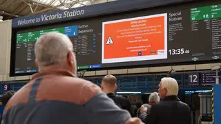 Signage at a rail station warning of strike action