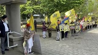 Members of British Columbia’s Sikh community gather in front of the courthouse in Surrey, British Columbia