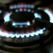 Energy bill next to gas hob