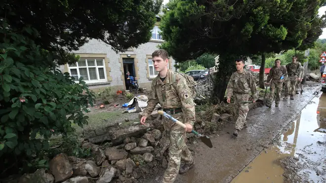 Soldiers from 2 Yorks arrive in Grinton, North Yorkshire to help out with flood damage, after parts of the region had up to 82.2mm of rain in 24 hours on Tuesday.