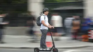 A man using an electric scooter