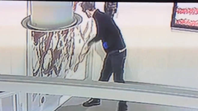 The moment the $3m painting was slashed