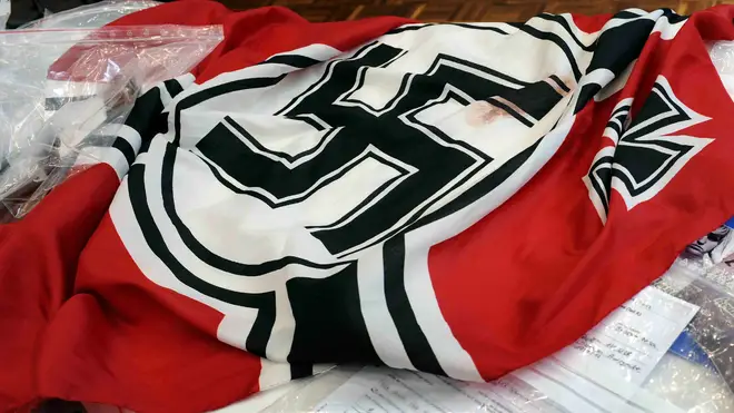 The Swastika flag was seen on the house early this morning