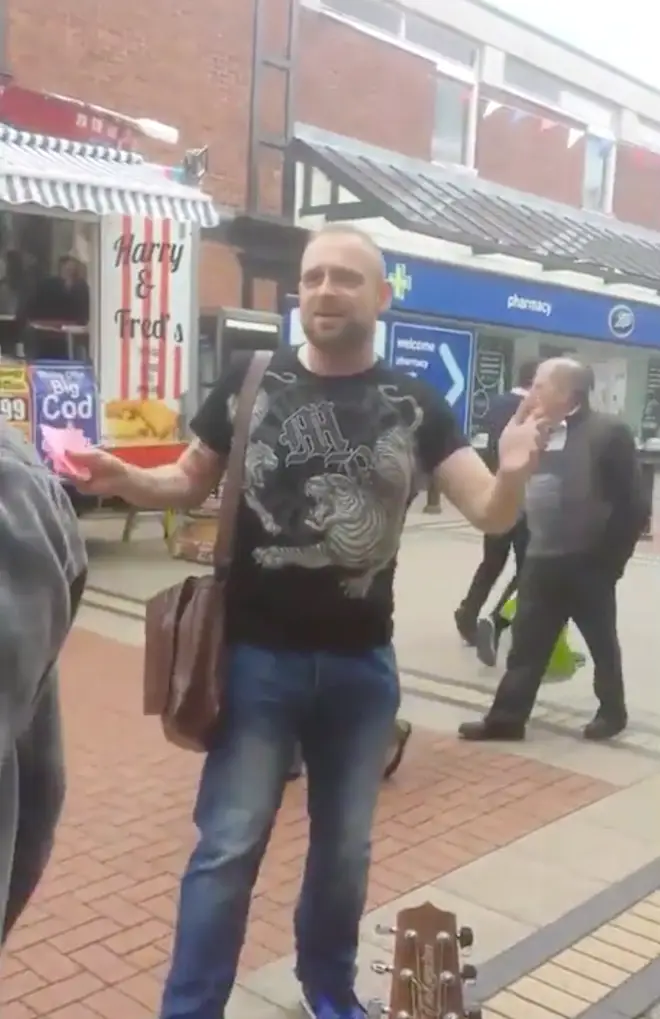 Dad-of-two businessman berates a group of buskers.