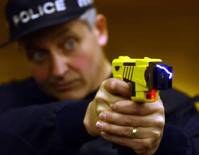 A US police officer discharges a taser
