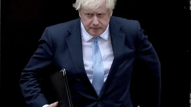 Boris Johnson strides out of 10 Downing Street