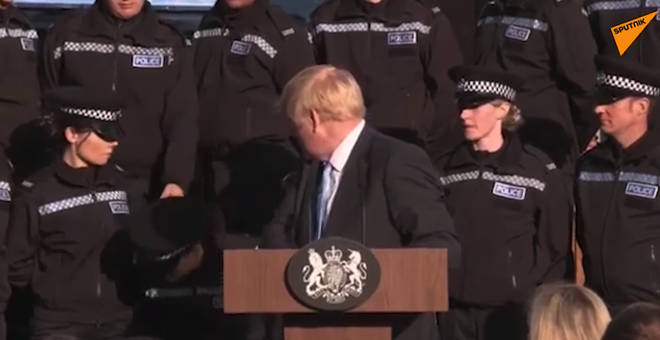 The police officer could not stand up any longer during the PM's speech.