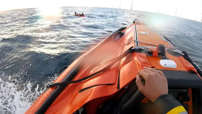A man was rescued after the toy dinghy he was in was blown a mile out to sea.