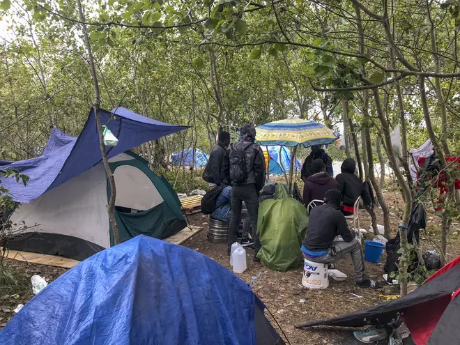 Tents near Calais, France where migrants seeking to get to the UK have set up camps again after being raided by French police.