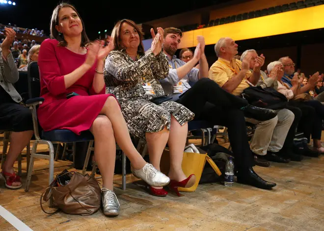 Jo Swinson (far left) applauding during the Liberal Democrats autumn conference at the Bournemouth International Centre in Bournemouth.