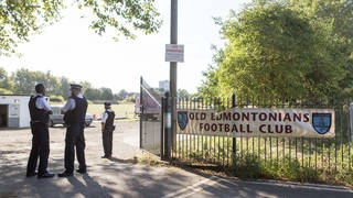 Police officers outside Old Edmontonians Football Club in Jubilee Park, Edmonton, following the fatal stabbing of a 29-year-old man.