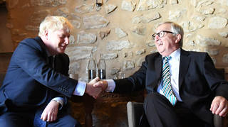 Boris Johnson shakes hands with Jean-Claude Juncker as the pair meet in Luxembourg