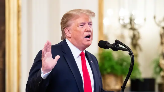 The US President says he&squot;s waiting for "definitive proof" Iran was behind a drone attack on two Saudi oil refineries before retaliating.