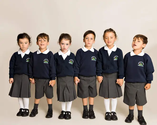 There are a set of boy triplets and a set of girl triplets in the class