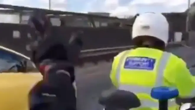 Biker slaps PCSO over the head on busy motorway