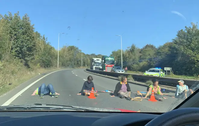 Some protesters superglued themselves to the roads in a bid to block traffic