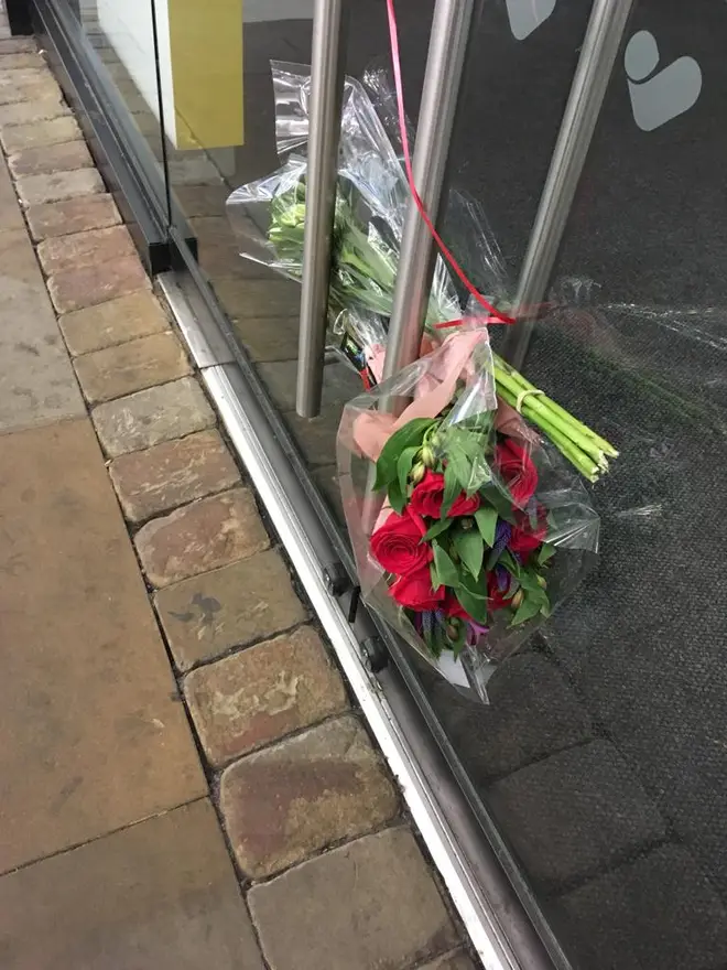 Flowers were left outside the branch