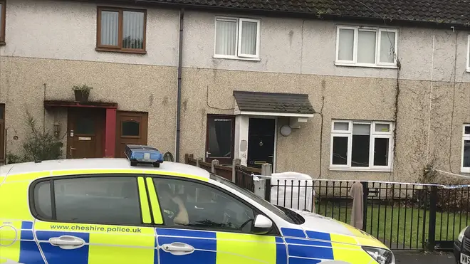The woman was found in a 'serious condition' at the house on Graham Road