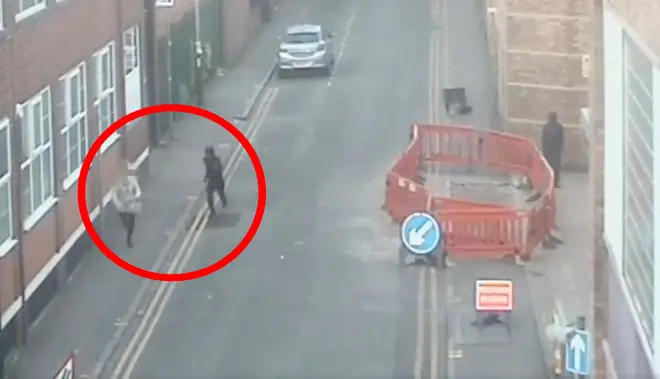 CCTV shows the woman being chased on her way to work