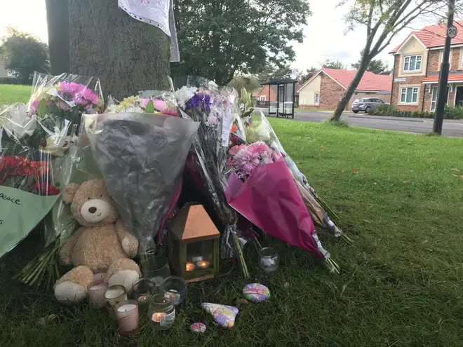Tributes left at the scene where the young girl was killed