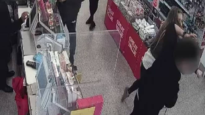 The woman punched the guard in the face before making off
