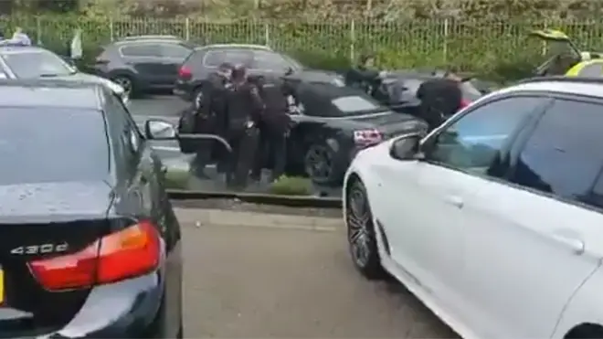 Police made four arrests after an armed swoop on a car in Essex