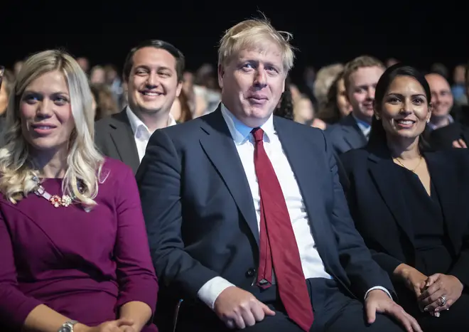 The PM Boris Johnson denies groping a female journalist
