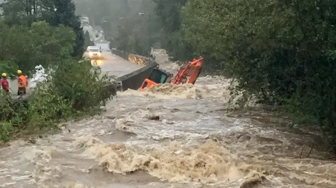 Vehicles, including a digger were washed away
