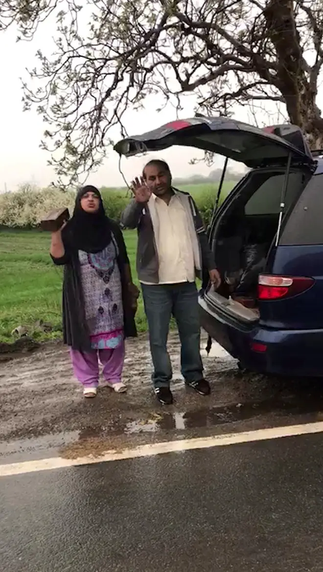 The man confronted the pair on a roadside near Wakefield, West Yorkshire
