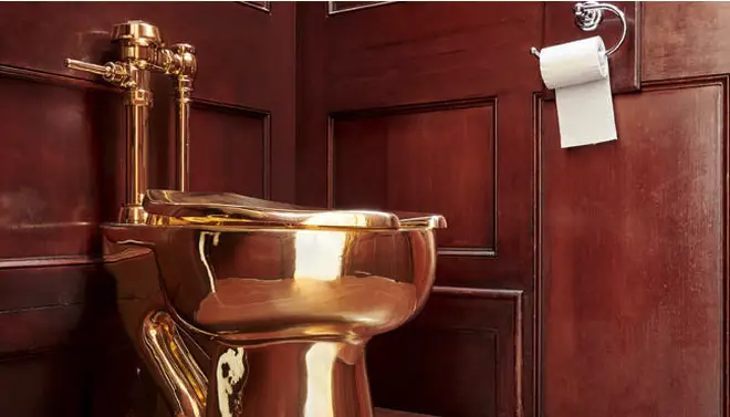 The gold toilet designed by Italian artist Maurizio Cattelan was stolen from Blenheim Palace in September