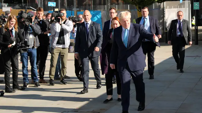 Boris Johnson arrives in Manchester to deliver his speech