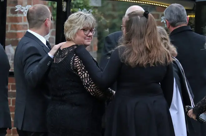 The parents of Libby Squire at the funeral procession