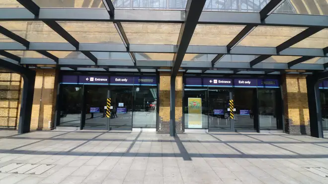 London King's Cross has been evacuated after football fans set off smoke flares in the station