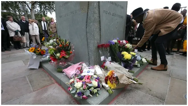 Families of the victims and survivors laid flowers to remember those who died in the disaster