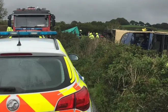 Emergency services are responding to a bus crash near Totnes