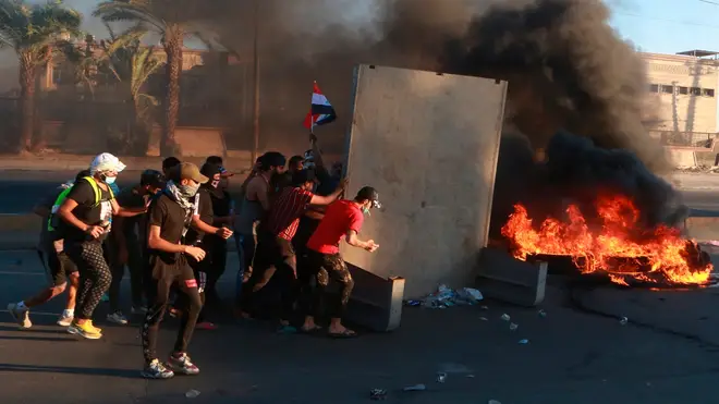 Protesters clashed with security forces on Baghdad