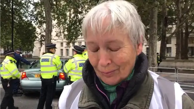 A tearful Extinction Rebellion protester