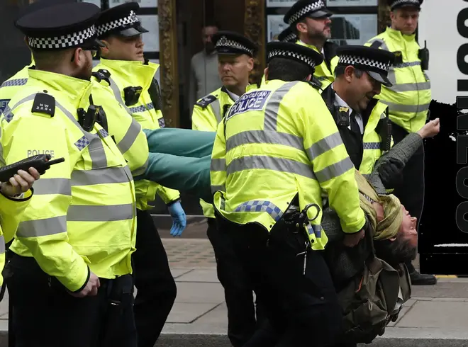 Police have started arresting protestors outside Whitehall