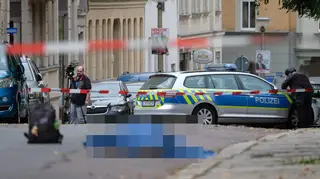 Police at the scene in Halle, Germany, after two people were killed